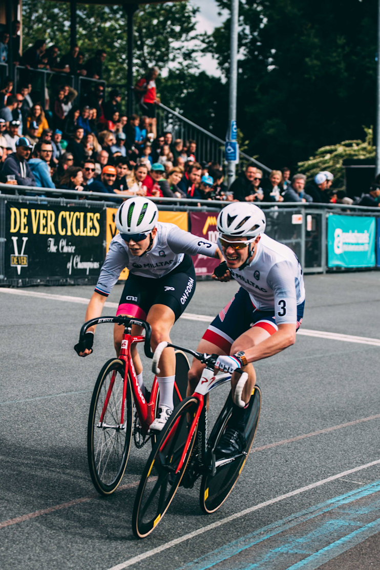 Two cyclist are racing